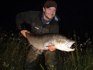 Allan with a large sea trout Allan with a large sea trout